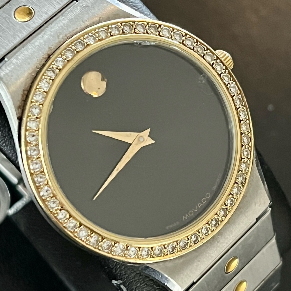 Unisex Movado steel and yellow gold watch with diamond bezel